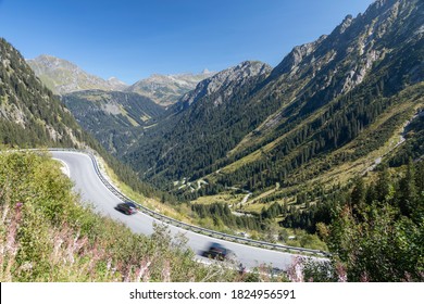 Cars riding at the curvy Silvretta Alpine Road in Austria (Silvretta-Hochalpenstrasse)