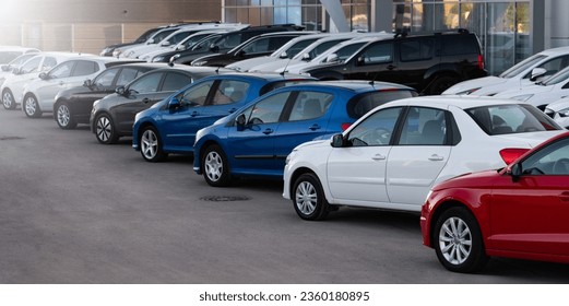 Cars in a row. Used car sales. - Shutterstock ID 2360180895