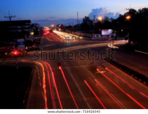 Cars  running\
on the road at night,blur\
focus.