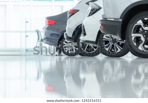 Cars For Sale, Automotive Industry, Cars
Dealership Parking Lot. Rows of Brand New Vehicles Awaiting New
Owners, on the epoxy floor in new car
service