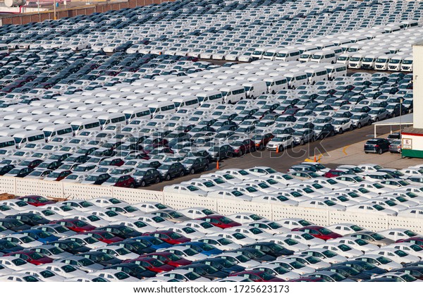 A lot of cars for sale.\
Car park.