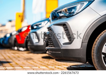 Cars for sale. Dealer inventory. Rows of brand new vehicles awaiting new owners