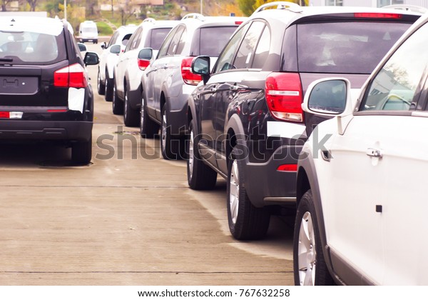 Cars For\
Sale Stock Lot Row. Car Dealer\
Inventory