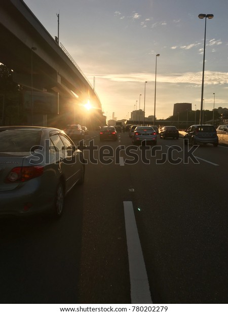 Cars are seen on the road as they make way to the\
city centre during peak hour in the morning in Kuala Lumpur on\
December 7, 2017.