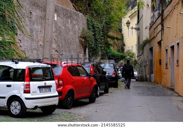 Cars are seen parked on the sight of street in\
central  Rome on October 29,\
2021