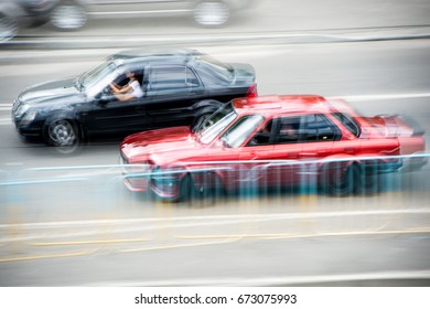 Cars At Speed. Street Racing. Blurred Cars At Speed.