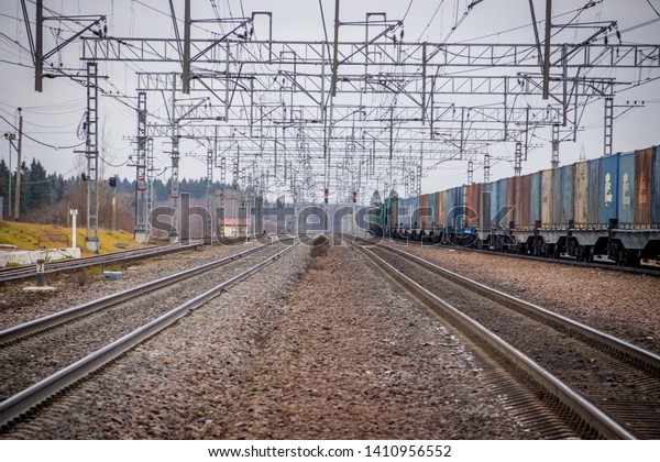 cars stand on the\
railways. Russian railway. Russia, Leningrad region, Troiskovitsy\
November 23, 2018