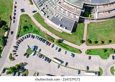 Cars Standing On Shopping Mall Parking Lot. Aerial View From Above.