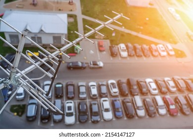 Cars stands in rows at city street parking lot top aerial view. Urban carpark from above.
