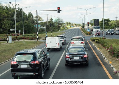 Cars Stop Red Traffic Light At The Intersection Of The Asian Highway