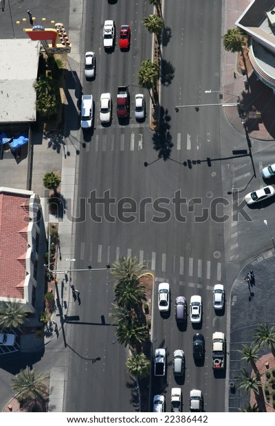 Cars stopped at a\
traffic light in Las Vegas