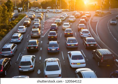 Cars stuck in traffic at an intersection - Shutterstock ID 120564112