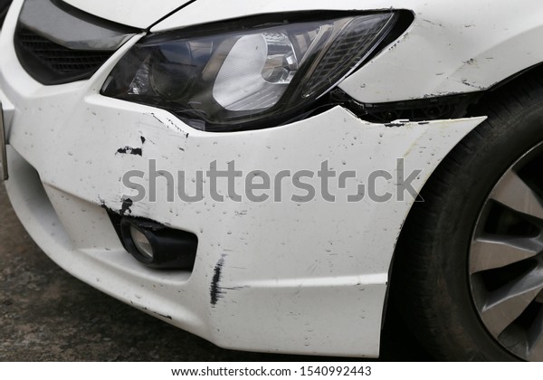 Cars that have been damaged by an accident in\
concept of safety and\
insurance.