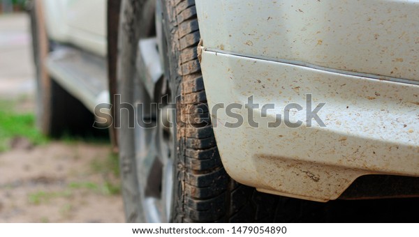 Cars that are muddy
background.
