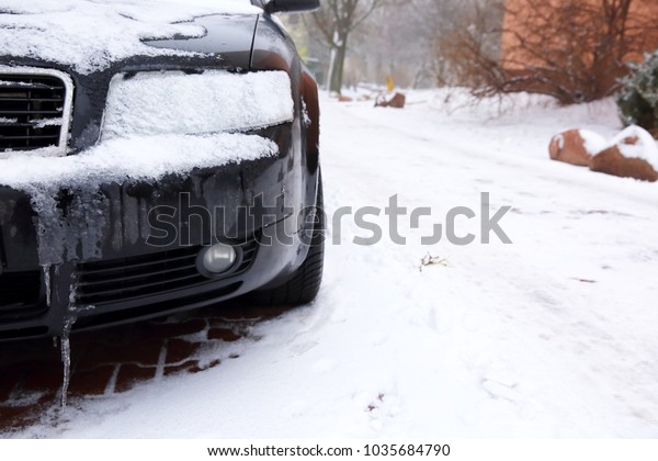 Cars that stand in the open air in the winter are\
usually exposed to frosty weather conditions and in addition,\
during snowfall are all\
white.
