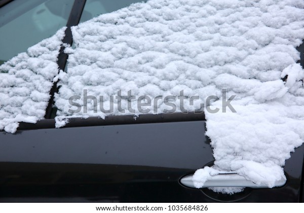 Cars that stand in the open air in the winter are\
usually exposed to frosty weather conditions and in addition,\
during snowfall are all\
white.