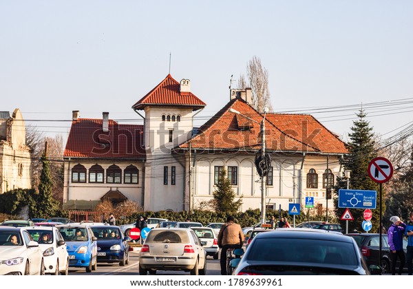 Cars in traffic car traffic at rush hour in\
downtown area of Targoviste, Romania,\
2020