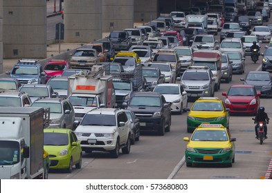 cars in traffic jam in a city during rush hour