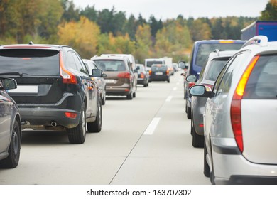 Cars In Traffic Jam In A Highway During Rush Hour