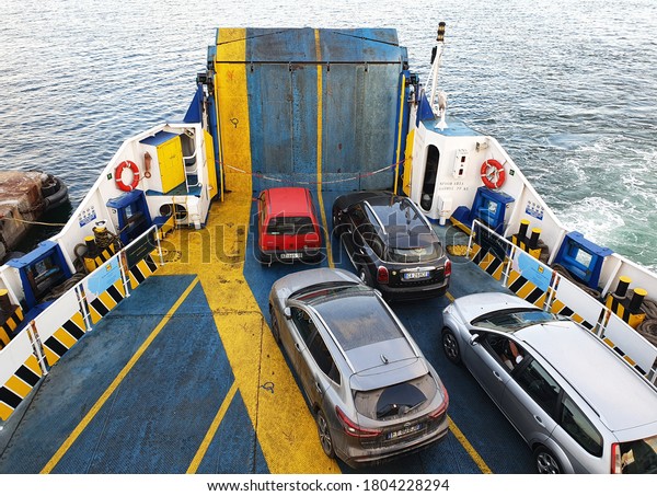 Cars are transported by sea ferry. 28 August 2020,\
Rome, Italy