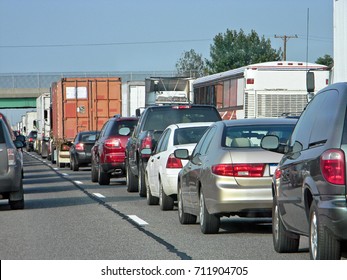 Cars And Truck On Highway In Traffic Jam