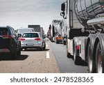 Cars and truck in traffic jam congestion at highway