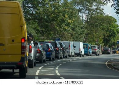 Cars And Vans Queueing In Heavy Traffic On A Busy London Road