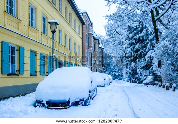 cars in winter - street\
scene