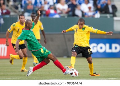 CARSON, CA. - JUNE 6: Grenada Player D Leon Johnson #14 (L) & Jamaica Player D Eric Vernan #8 (R) During The 2011 CONCACAF Gold Cup Group B Game On June 6 2011 At The Home Depot Center In Carson, CA.