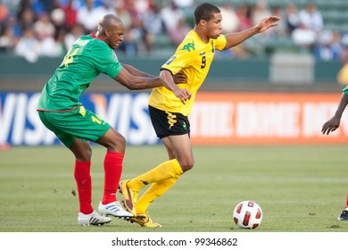 CARSON, CA. - JUNE 6: Grenada D Leon Johnson #14 (L) & Jamaica F Ryan Johnson #9 (R) During The 2011 CONCACAF Gold Cup Group B Game On June 6, 2011 At The Home Depot Center In Carson, CA.