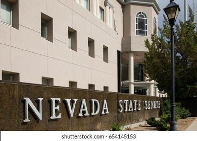 Carson City, NV – July 18, 2014:  Nevada State Senate Sign In Front Of The Nevada State Legislature Building In Carson City.  The Nevada Legislature Meets Every Other Year For 120 Consecutive Days.