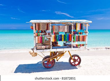 Cart selling typical souvenirs on the beautiful cuban beach of Varadero