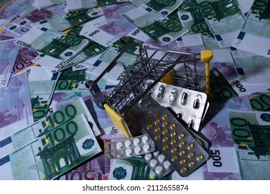 a cart from a supermarket store on a background of money. there are pills and medicine in the cart. small cart abstract background texture background of a billboard or poster day