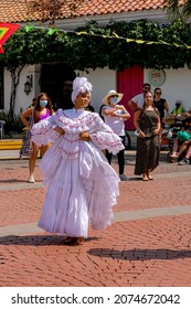 Cartagena, Bolivar, Colombia; 11- 11- 2021: Woman dance the Cumbia traditional in the feast of the independence of Cartagena.