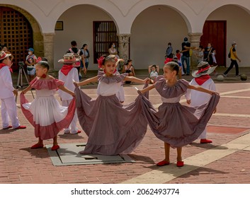 
Cartagena, Bolívar, Colombia; 10-17-2021: Girls Preparing A Presentation Of Folk Dance On The Day Of The Race.