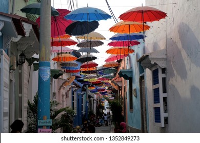 Cartagena, Cartagena Province, Colombia, March 1, 2019. View Down Quirky Umbrella Alley, Or Callejón Angosto, In The Getsemani Neighborhood