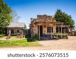 Carthage, MO USA - April 28, 2018: Cackleberry Arch Park - Red Oaks II, a village of relocated and restored buildings and other artifacts near historic Route 66.