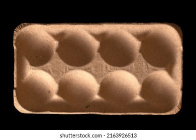 Carton paper texture isolated on a black background. Cardboard paper used in packing, storing, and transporting fruits.