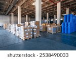 Cartons on the pallet at logistics warehouse