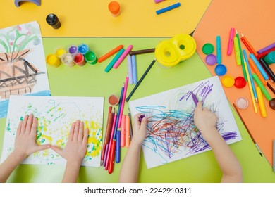 cartoon food collection, fruit and vegetables child drawing, top view hands with pencil painting picture on paper, artwork workplace - Powered by Shutterstock