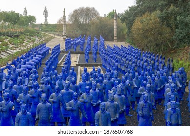 Carvalhal Bombarral, Portugal - 13 December 2020: blue Chinese terracotta warriors in the Buddha Eden Garden in Portugal
