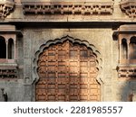 Carved Arches  Windows of fort wall of Rajwada, Indore, Madhya Pradesh. Also known as the Holkar Palace or Old Palace. Indian Architecture.