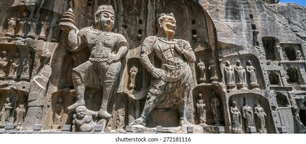 Carved Buddha images at Longmen Caves, Dragon Gate Grottoes, dating from the 6th to 8th Centuries, UNESCO World Heritage Site, Henan Province, China, Asia.