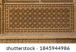 Carved ornament on the walls in Jaisalmer (India), Sand Rock texture, decorative pattern in oriental style. Carved wall texture, background