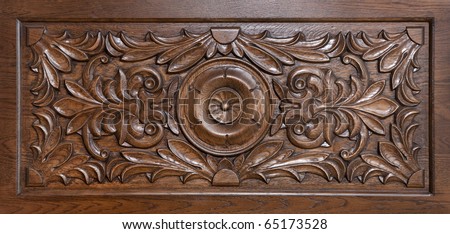 Carved pattern on wood, element of decor