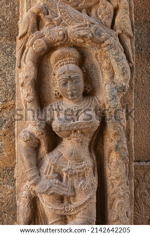 Carved scuplture of woman on entrance gate of Someshwara Temple, Kolar, Karnataka, India