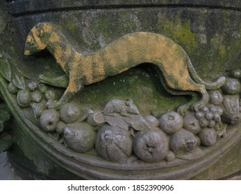 Carved Stone Detail Of A Stout And Mouse