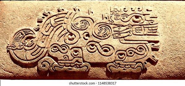 Carved  stone Inca design on a doorway lintel in Cusco Peru