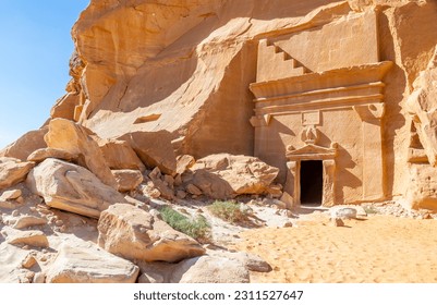Carved in stone nabataean tomb in Jabal al Banat complex, Hegra, Al Ula, Saudi Arabia - Shutterstock ID 2311527647