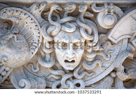 Carved Stone Panel of Medusa a Greek mythological creature 